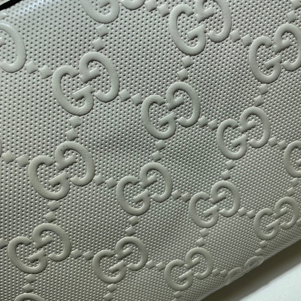 G*u*i gg embossed messenger bag