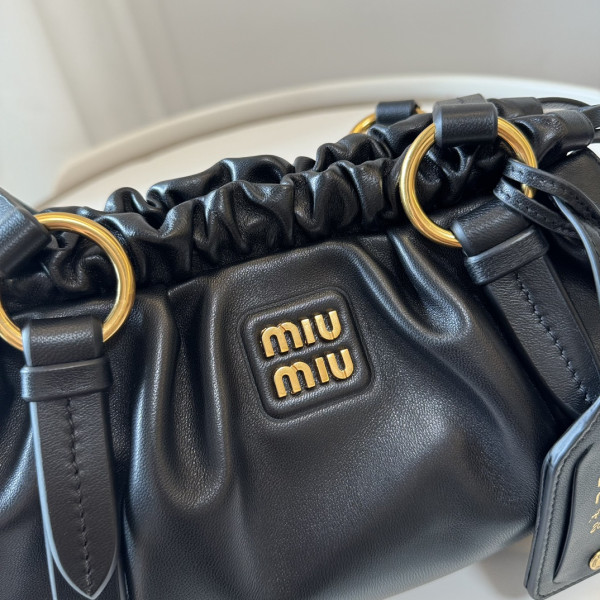 M*um*u joie nappa leather bag
