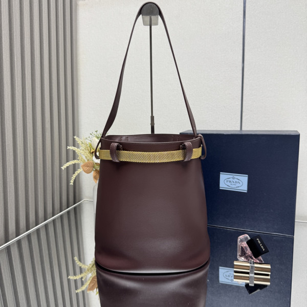 Pra*a buckle leather bucket bag with jeweled belt